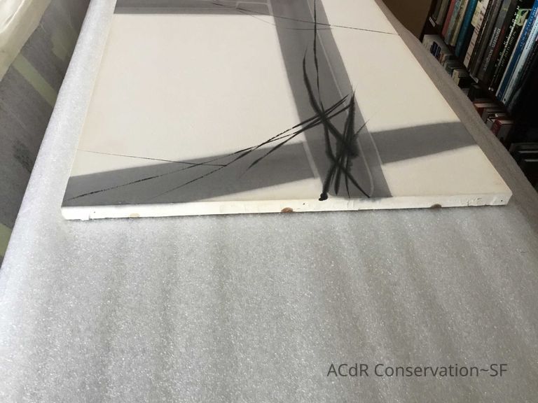 Before treatment - same rusty discoloration spots along top edge. Discoloration of sides also visible 