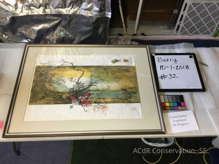 Water scene with red floral motif