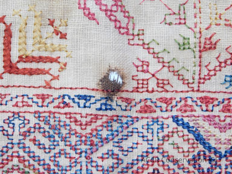 #12 hole and dark brown stain