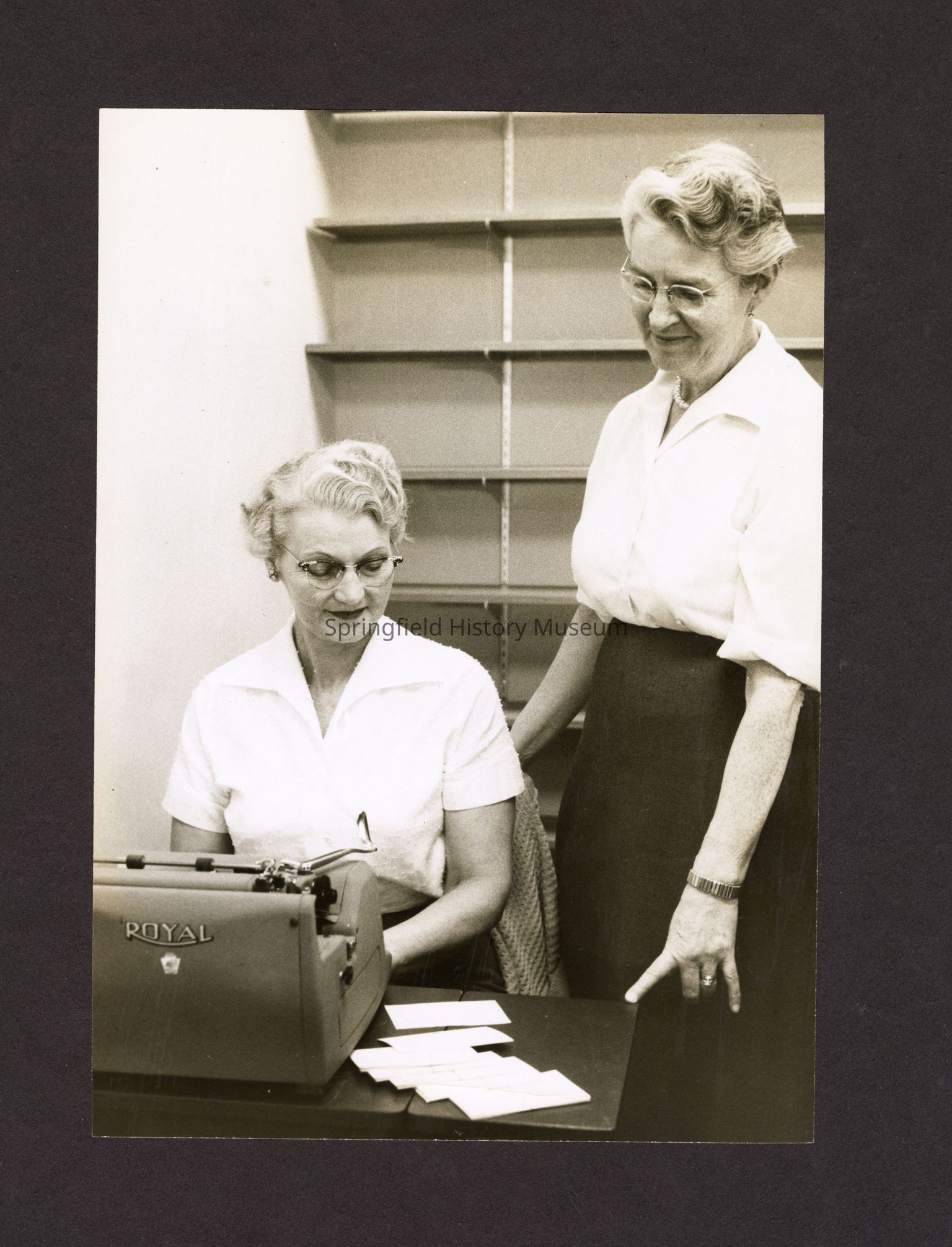 Photograph of the 1960s Springfield Public Library and staff