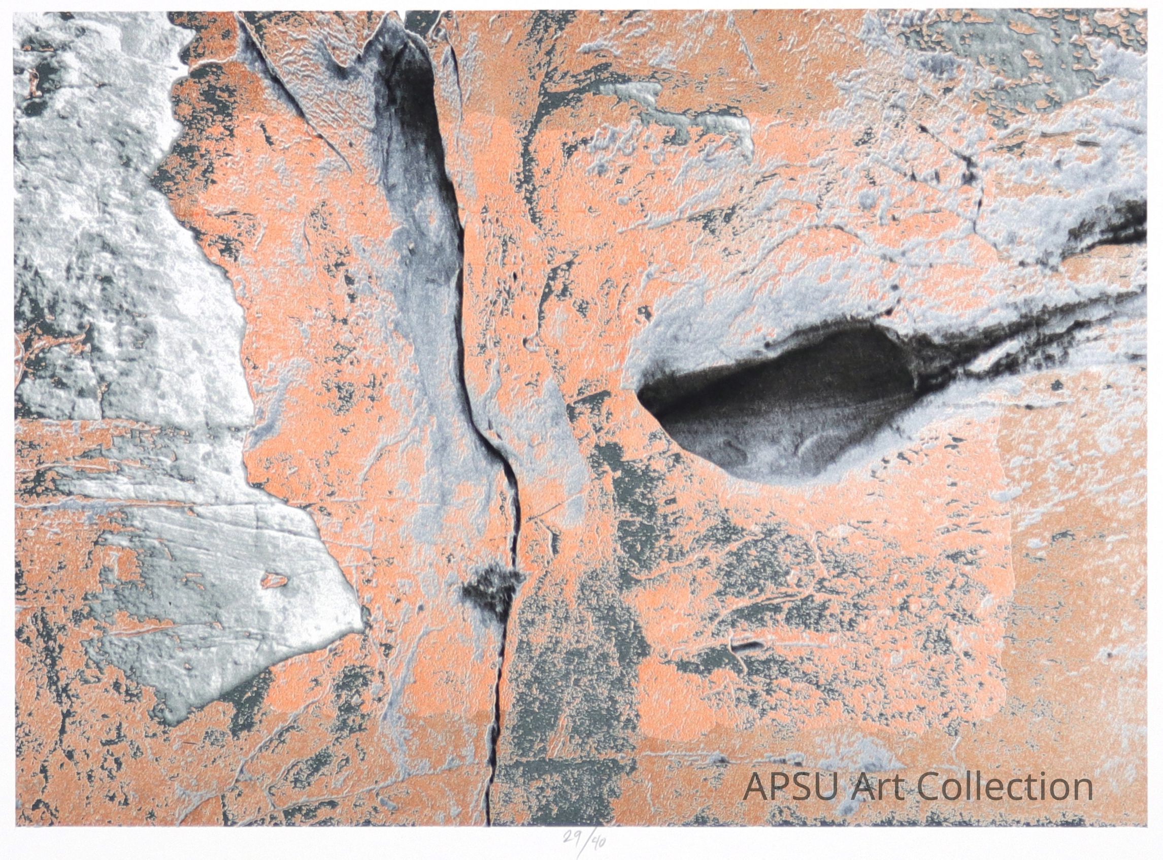 The image shows a textured abstract artwork that appears to mimic the rugged surface of a rock or a strange lunar landscape. Dominated by shades of gray contrasted against vibrant orange patches, the artwork presents deep crevices and protruding formations that create a dramatic, three-dimensional effect. The number "29/40" at the bottom suggests it could be a limited edition piece in a series. The overall composition gives an impression of natural decay or erosion captured in a moment of stillness.