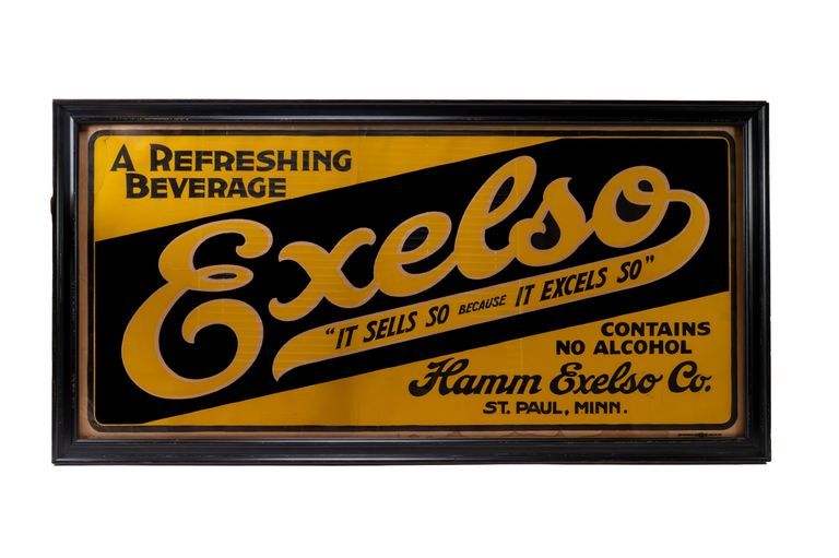 Exelso "It Sells So Because It Excels So" Framed Cardboard Sign