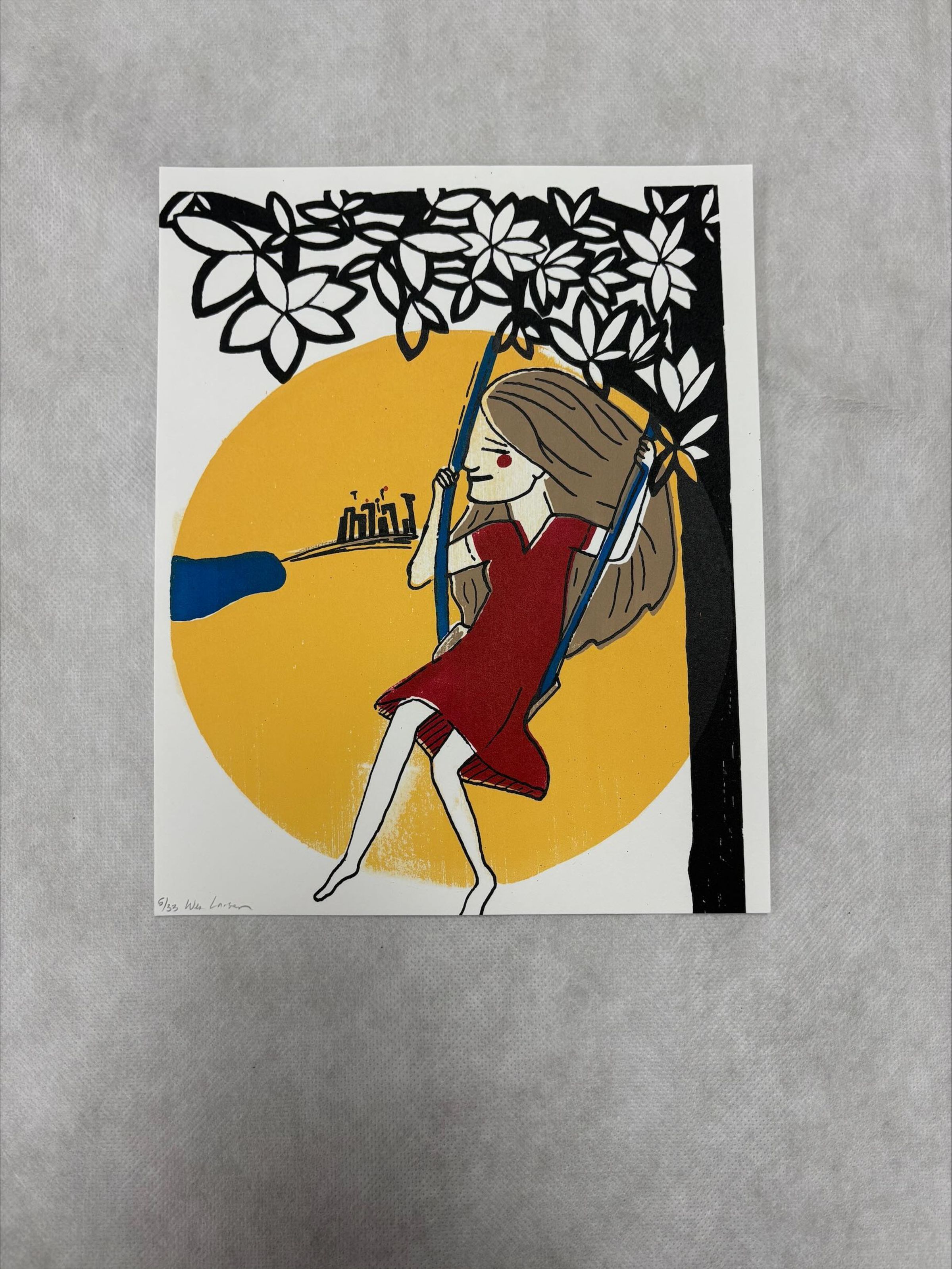 Front: A vertically oriented, medium sized print that uses red, yellow, blue, white and black. The composition of this print consists of a central figure that sits on a swing attached to a tree as she swings in front of a yellow circle with structural forms in the background.