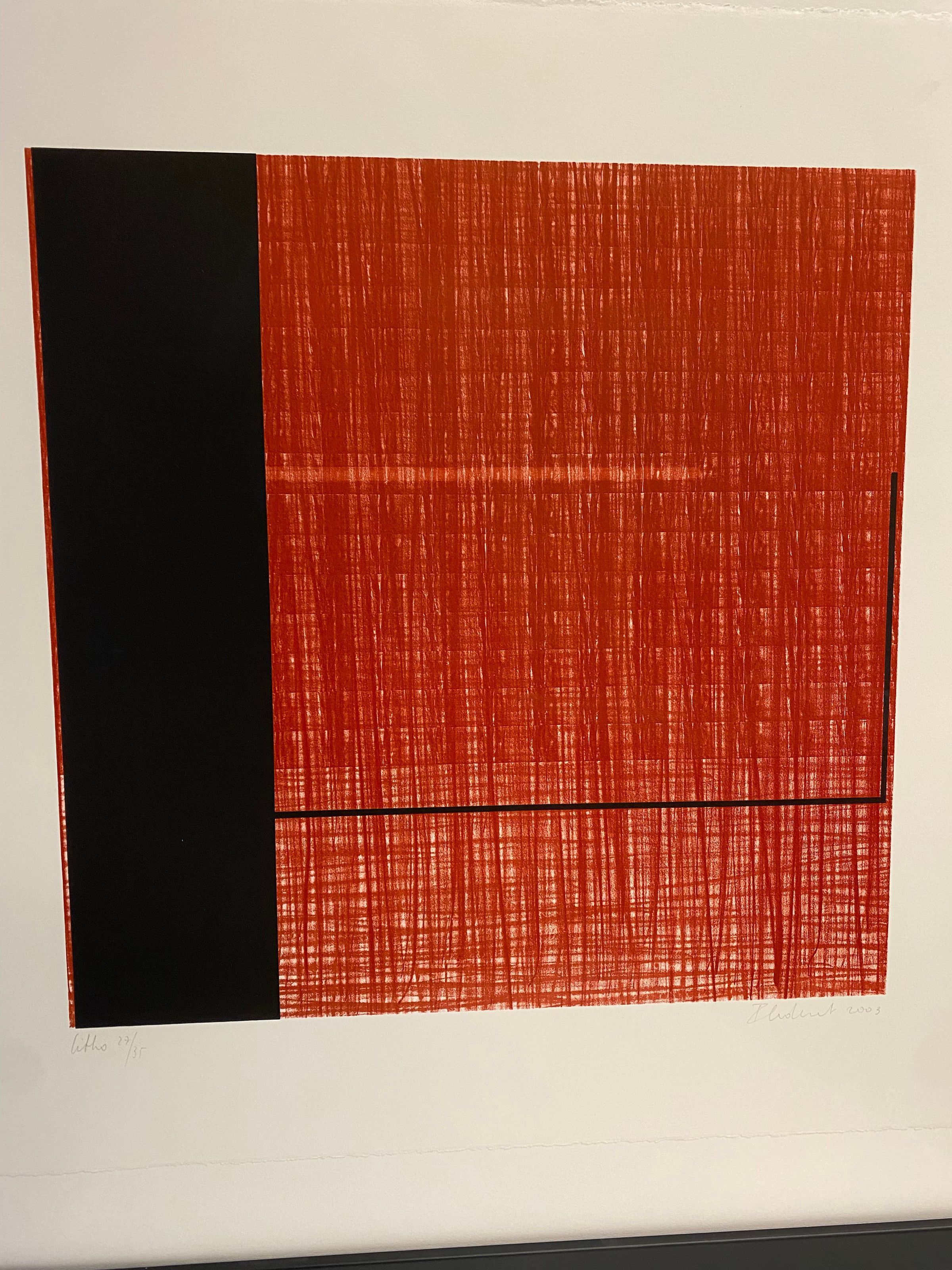 Litho (27/35): Large square vertical print with geometric shapes and lines utilizing black and red tones. The image consists of a vertical black rectangle on the right proper printed on the red etched background with a thin horizontal line protruding from the rectangle horizontally in the bottom region of the print from right to left, which then stops at a ninety-degree angle and orients vertically continuing to the top of the center region of the print.