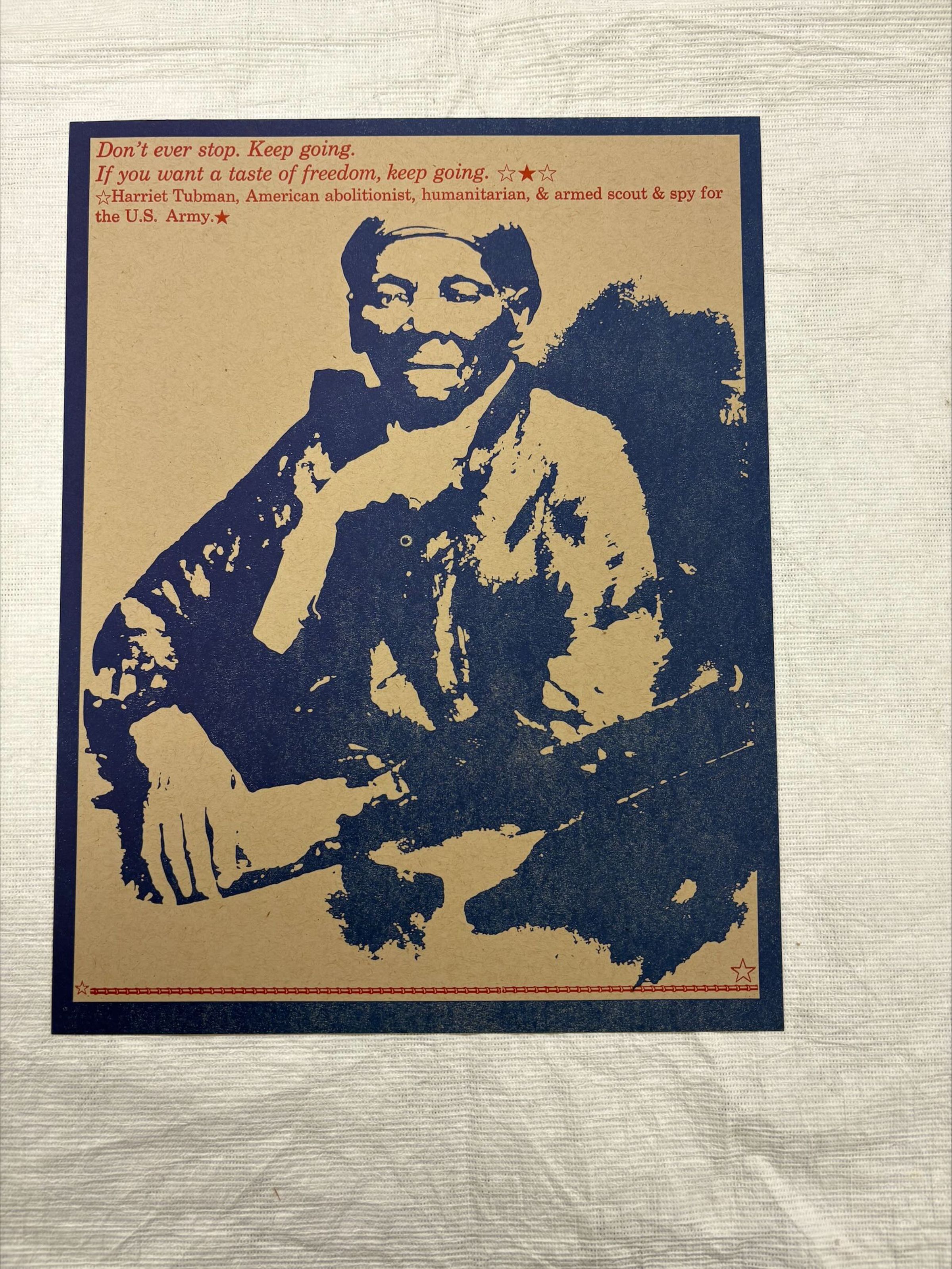 Front: A vertical oriented linoleum block print showing the portrait of African American abolitionist Harriet Tubman with a quote of her's above her. The print is based of a photograph of Tubman taken by W.H Ernsberger in the 20th century.