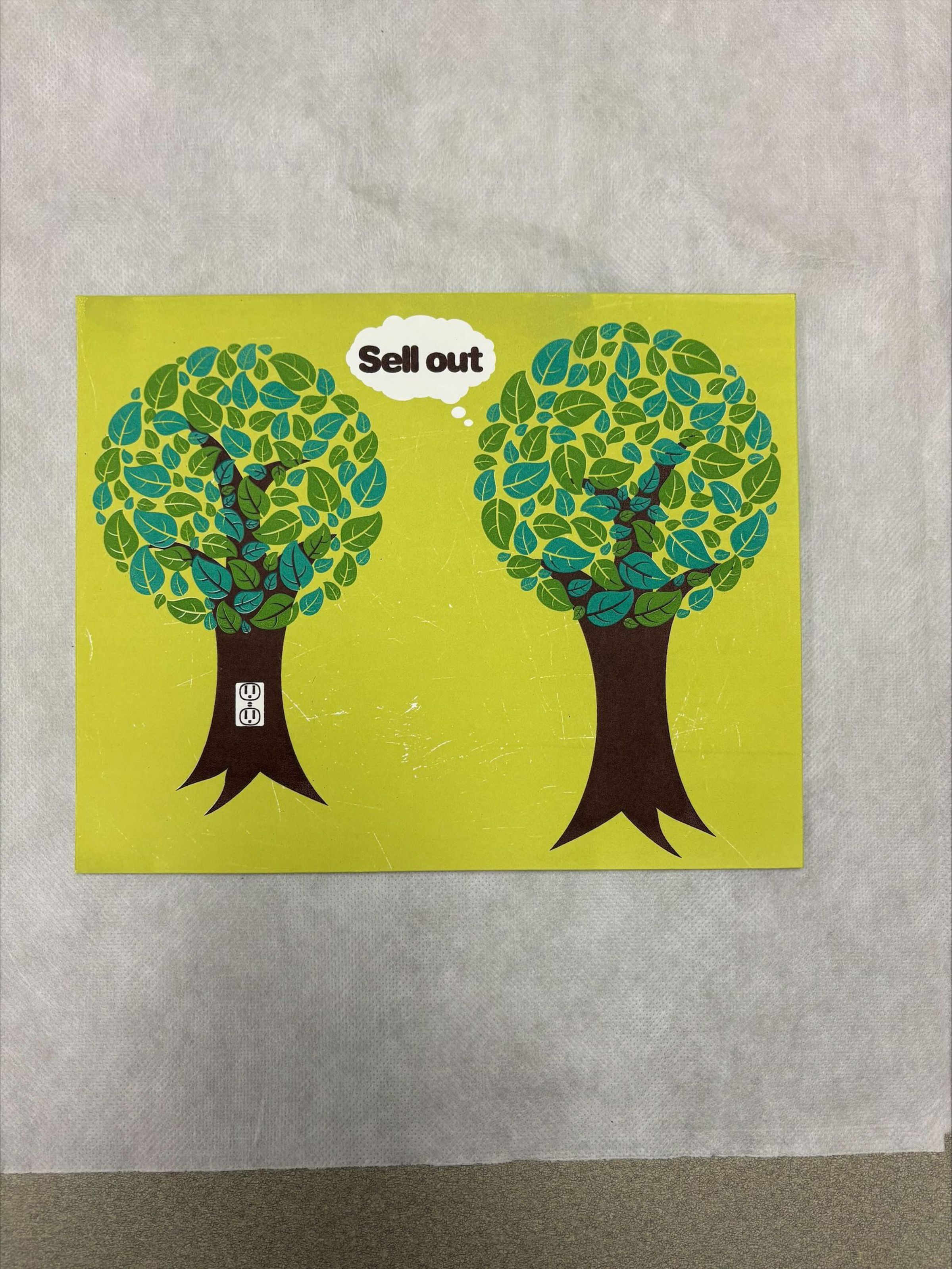 Front: A horizontally oriented, medium sized print that uses shades of green, brown, and white. The print features both text and imagery, with the main subject being two trees that take up most of the picture plane as one calls the other a sell out.