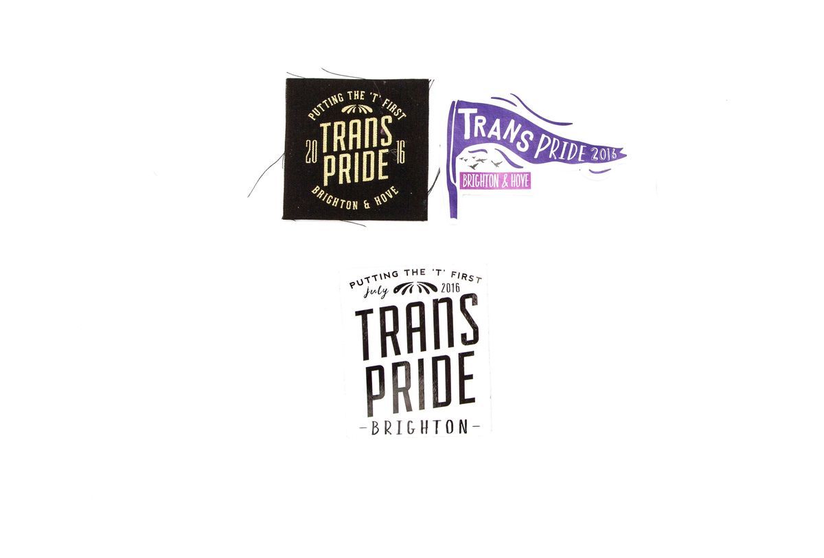 The image features three objects, a patch and two sticker designs promoting Trans Pride 2016 in Brighton and Hove.