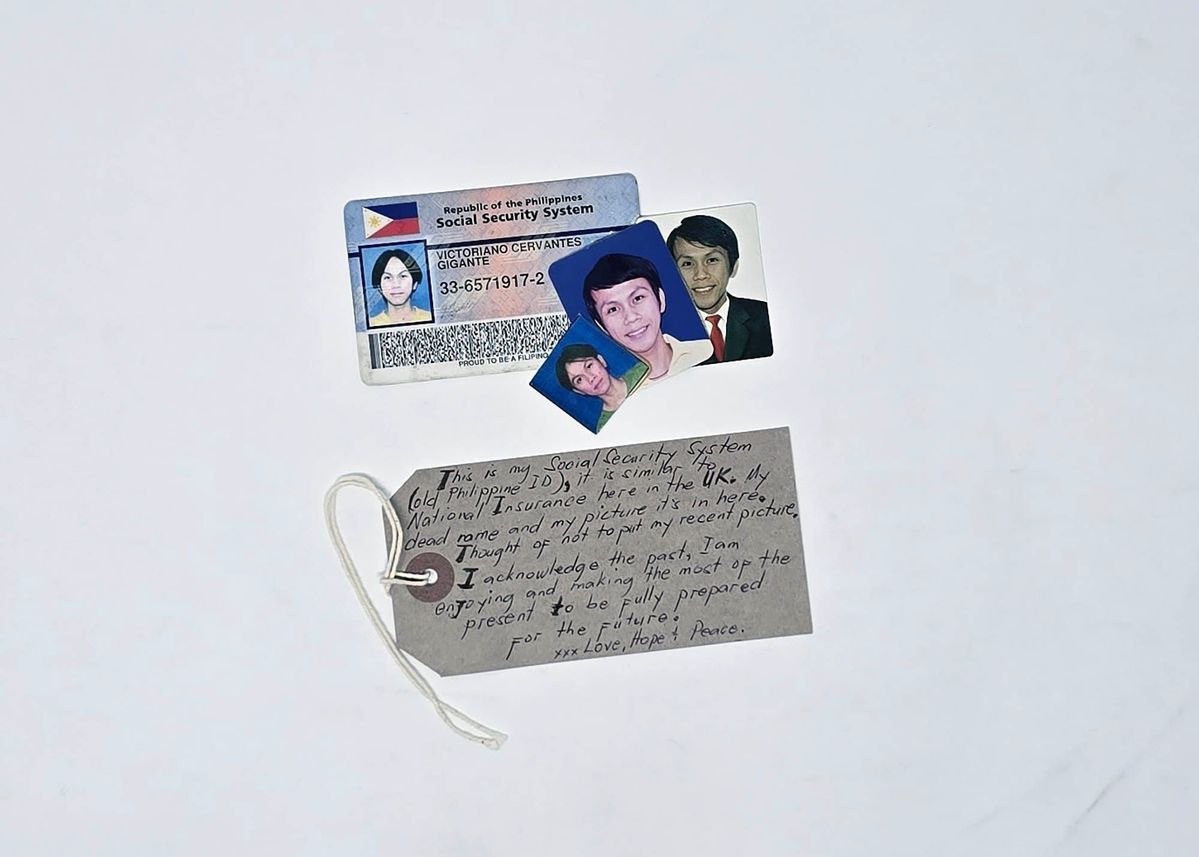 Card has three small photographs glued to it, signs of wear, photos look old.