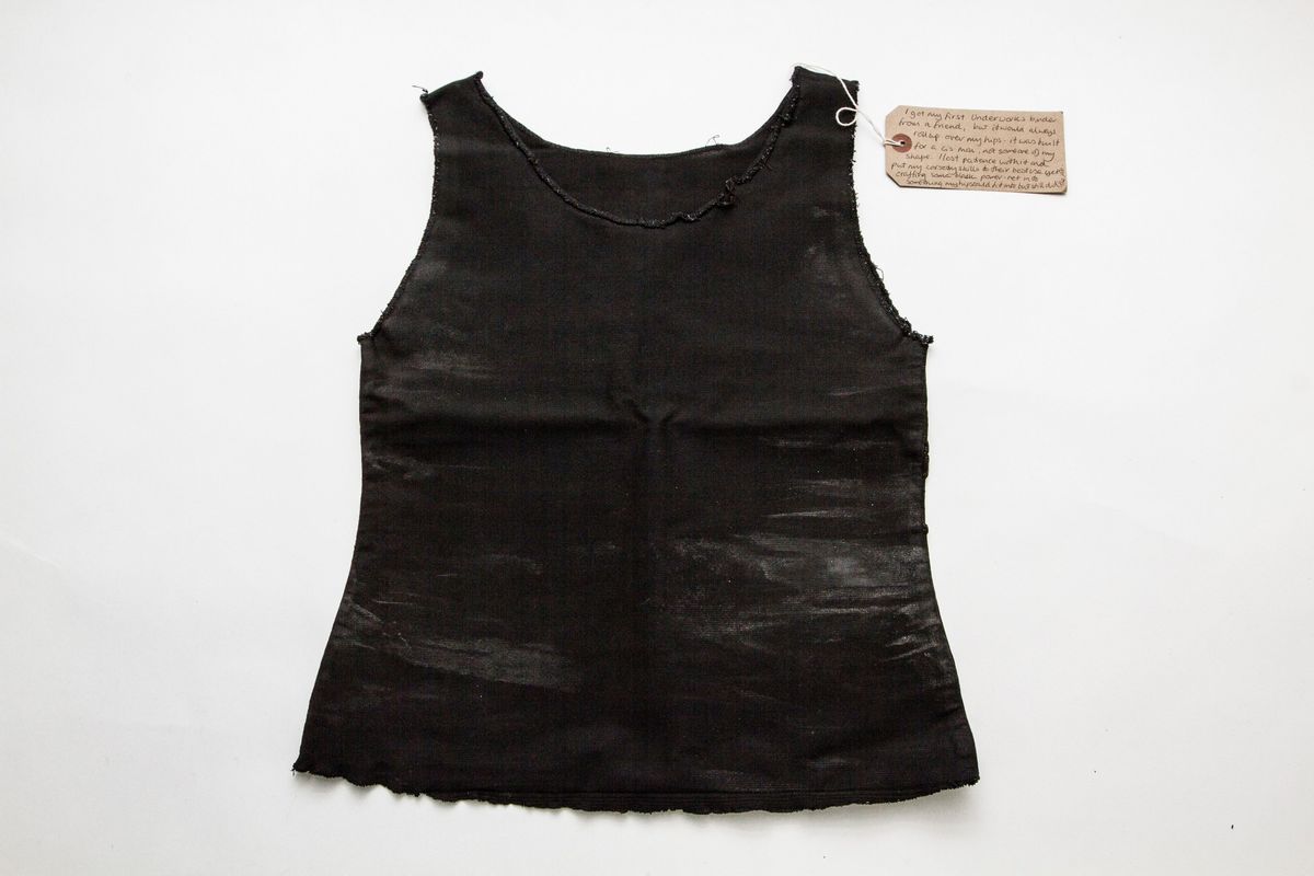 A black binder on a white background.