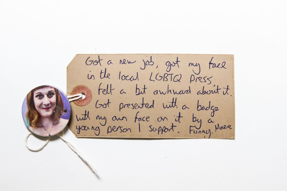 Badge Of Womans Face On Purple Background.