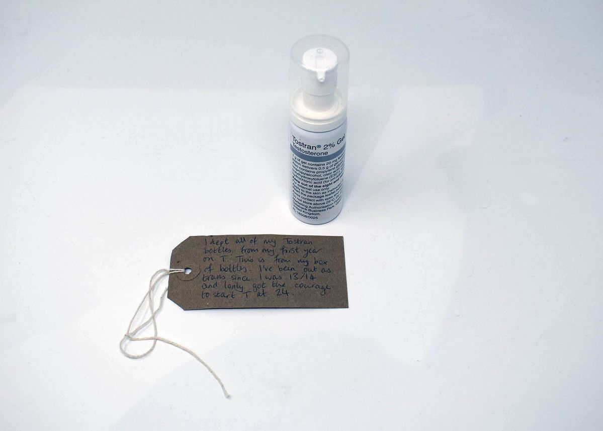 White metal can with white plastic nozzle and clear plastic lid. Bottle label reads "Tostran 2% Gel Testosterone" with additional information about the medicine.