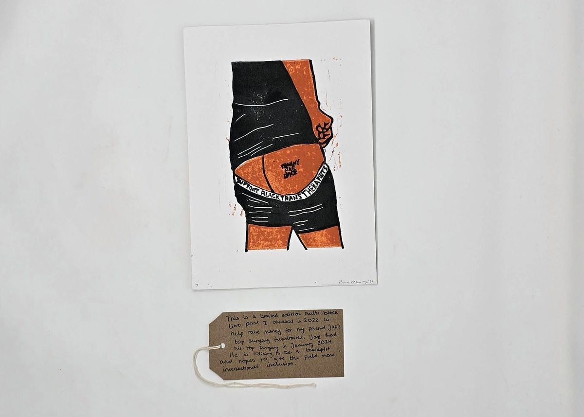 A print of a River Manning illustration. It shows the rear torso and upper legs of a person wearing a black top and shorts. Their shorts are partially pulled down to reveal at a tattoo "TRANNY FAG DYKE" on their right buttock. With a brown, handwritten luggage tag.