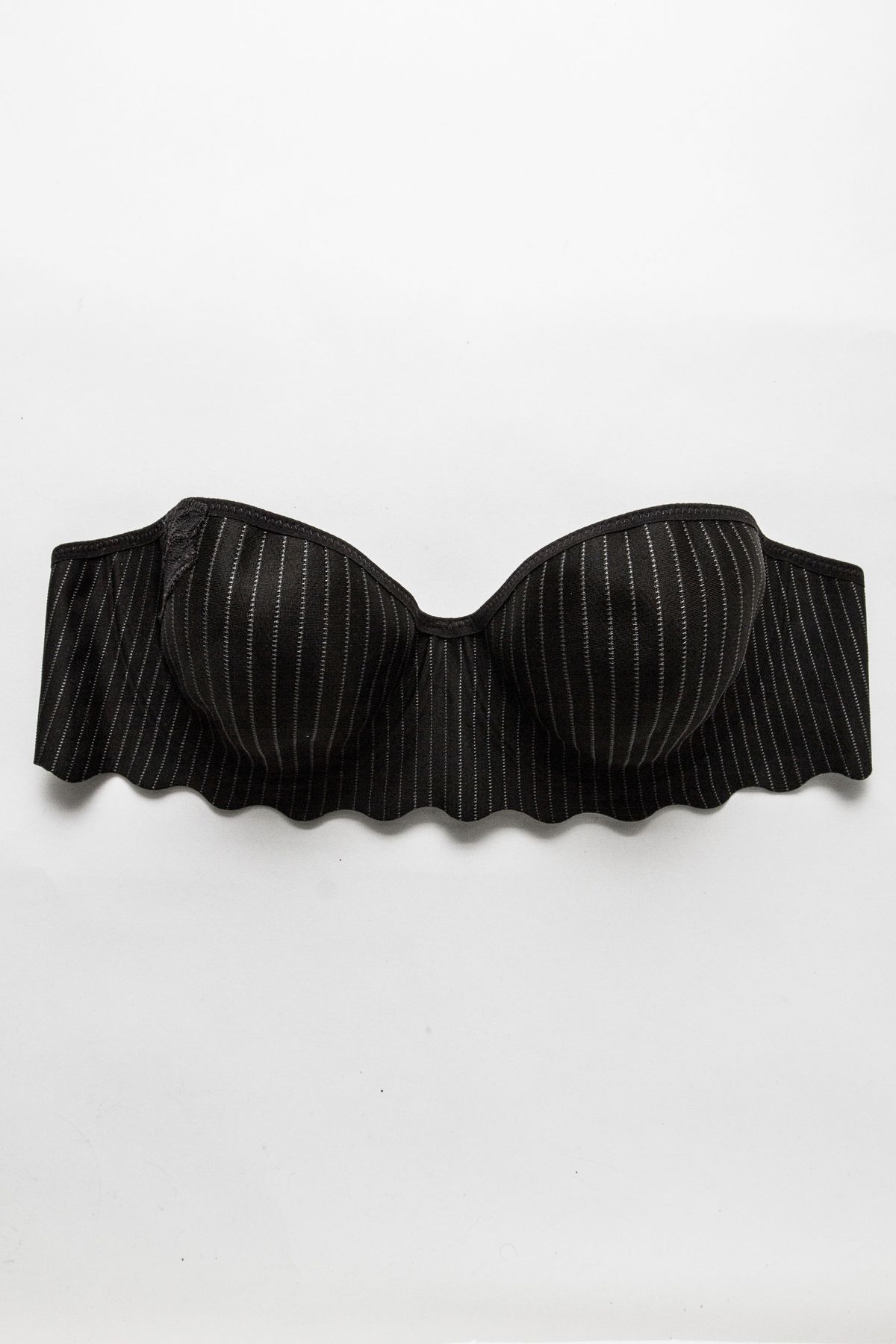 Black sleeveless bra with white pinstripes.