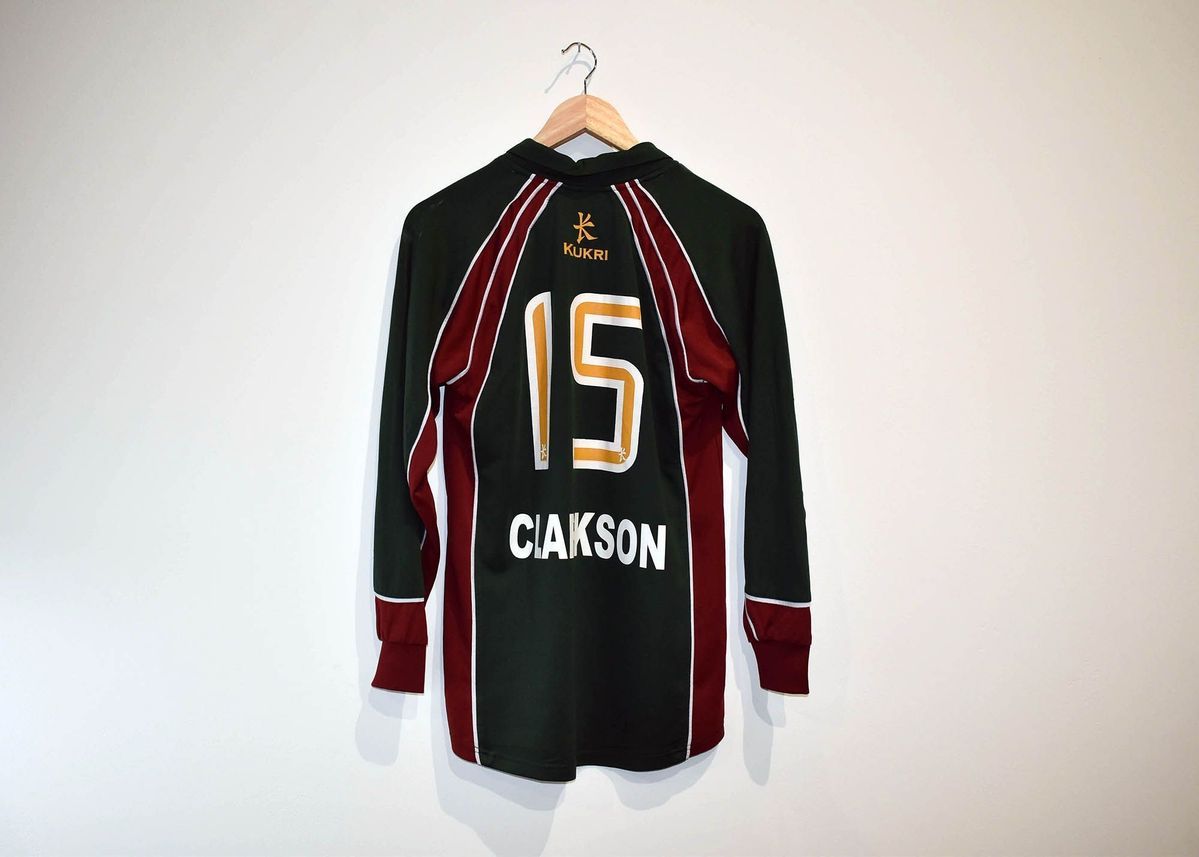 A football long sleeved t-shirt which has the no.15 on it.