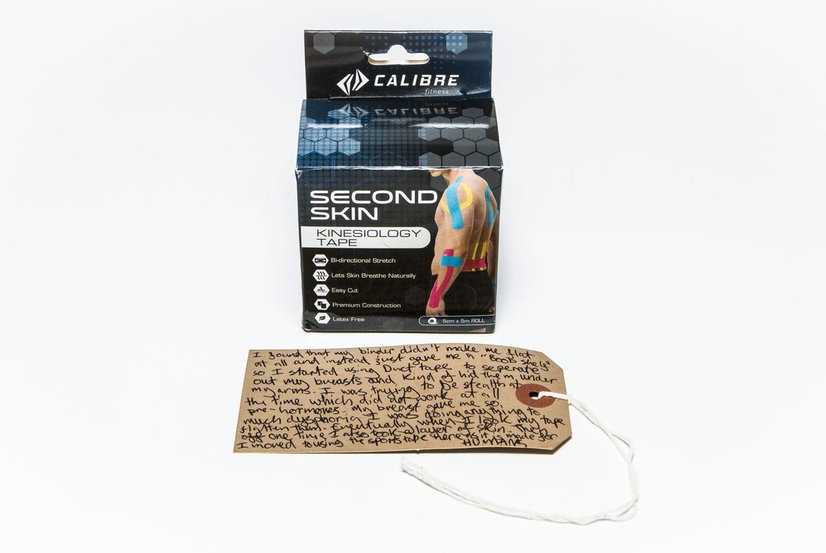 Black box reading "SECOND SKIN KINESIOLOGY TAPE" with a photo of a shirtless person covered in various colours of tape.