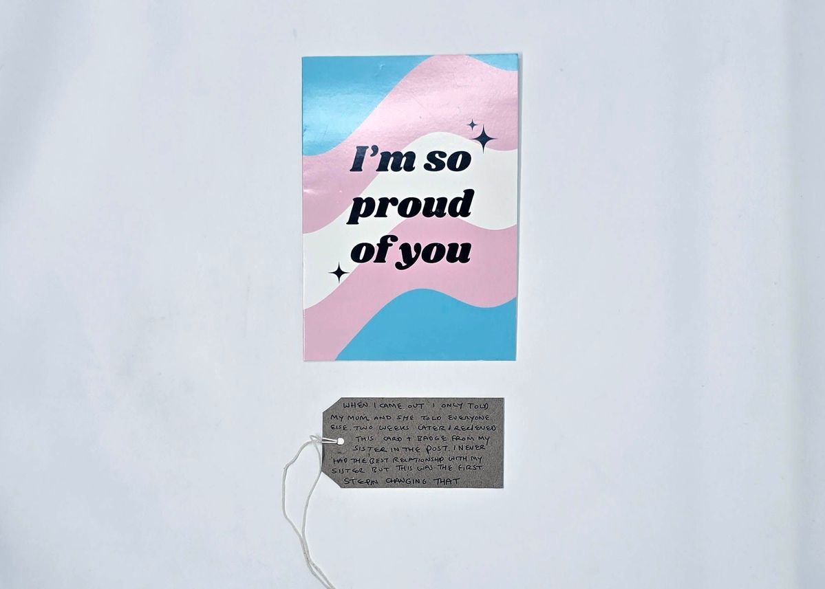 The image shows a colorful card stating "I'm so proud of you," above a heartfelt note.