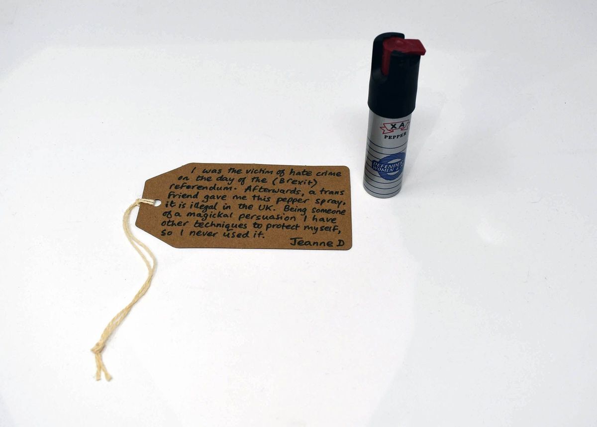 Cylindrical pepper spray canister reading "XA" on a banner and the worders "pepper", "defender of women & men."