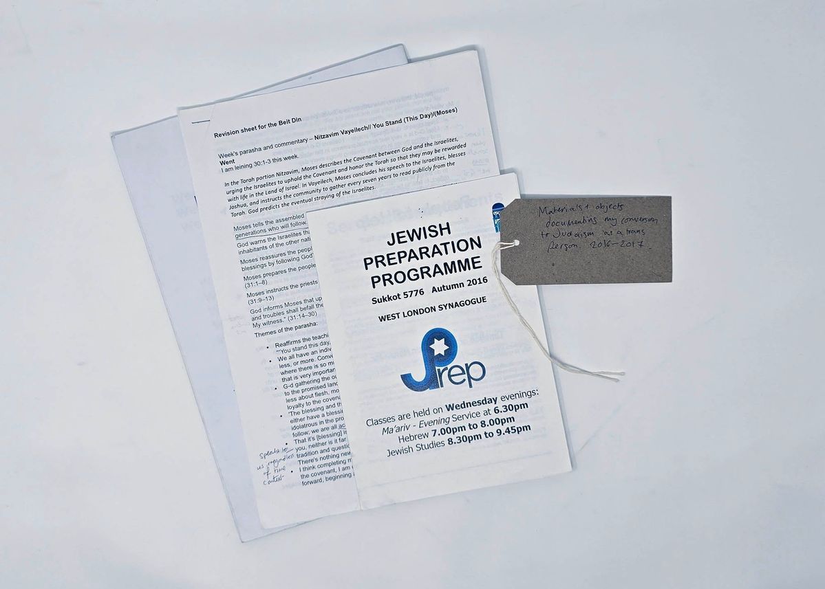 Documents relating to religious conversion to Judaism. With a brow, handwritten luggage tag.