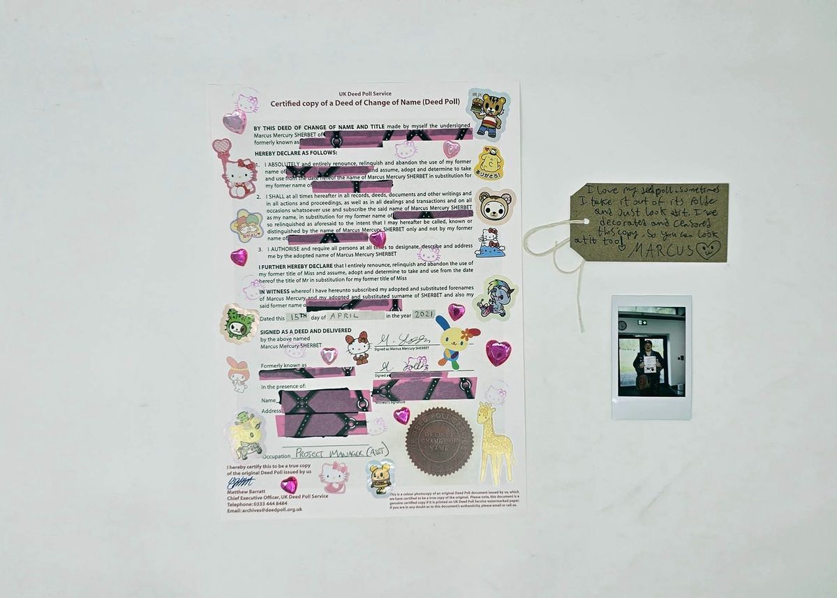 A deed poll letter which has been decorated in stickers and tape covering bits of information.