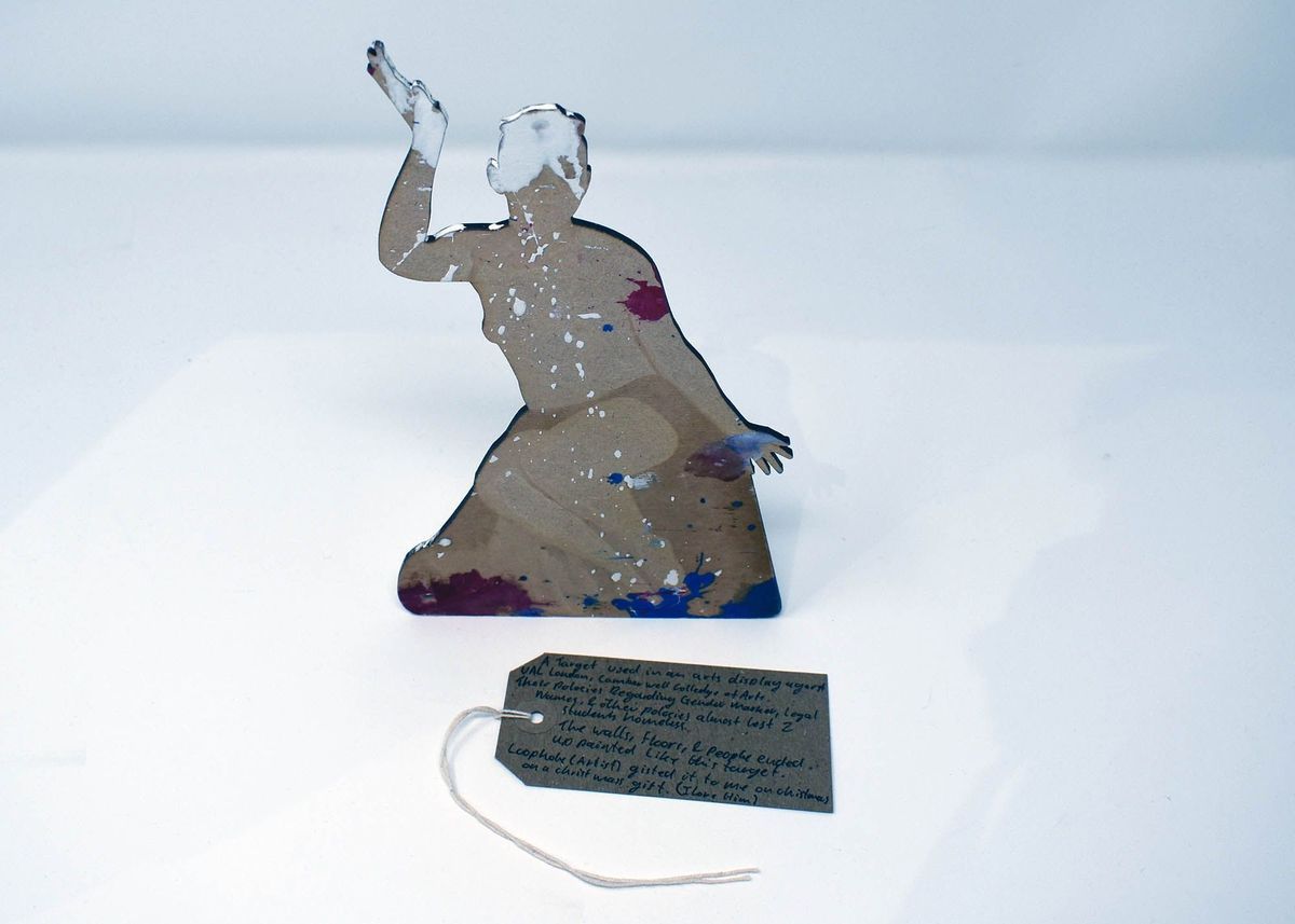 Woodcut portrait with paint splatters and associated tag in whitebox.