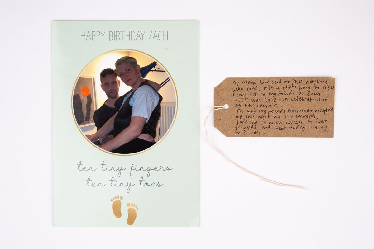 The image shows a birthday card with a heartfelt message about new identity and acceptance.
