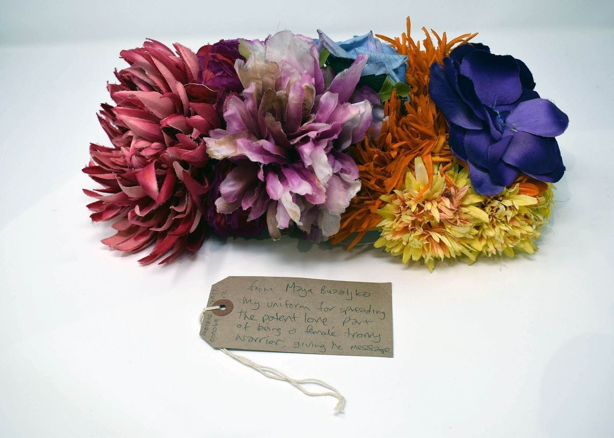 Bra made of various pink, purple, and yellow flowers.