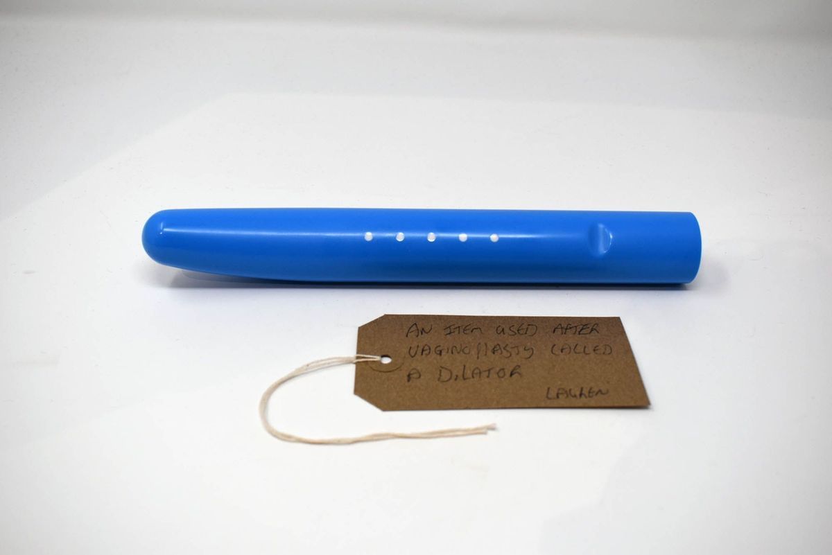 Soul Source blue dilator with brown luggage tag