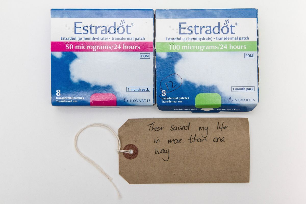 One blue box with greens stripe reading "Estradot 100 micrograms/ 24 hours" and one blue box with pink stripe reading "Estradot 50 micrograms/24 hours"