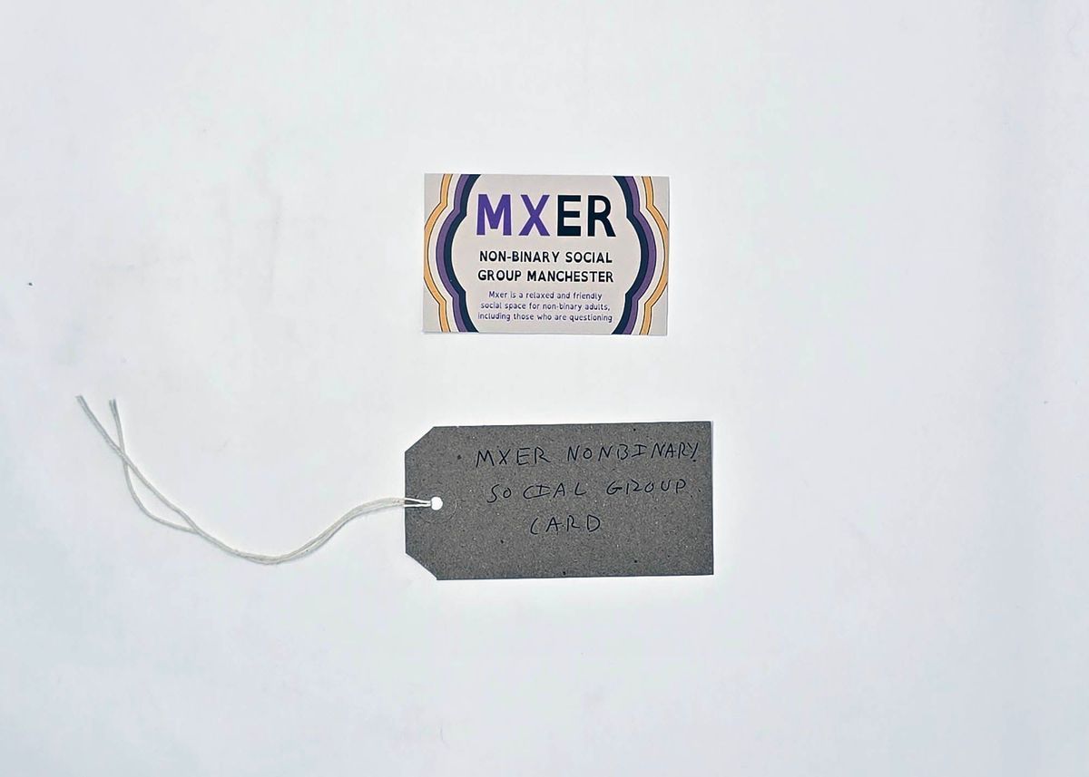 The image shows a label and card promoting a non-binary social group.