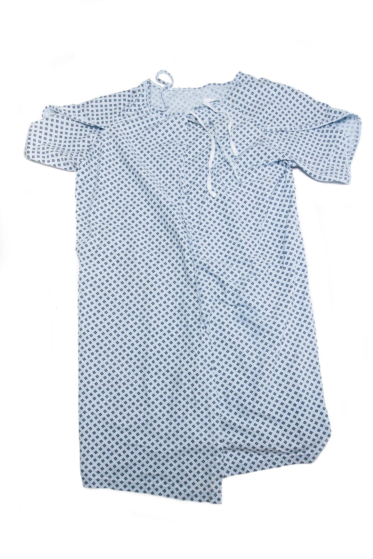 The image shows a light blue hospital gown with a diamond pattern and ties at the back.