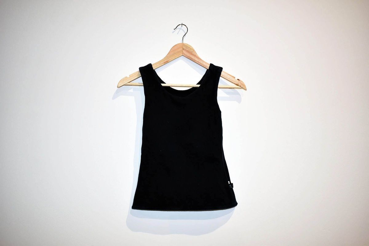 Black, T-Kingdom brand, binder on a wooden hanger.