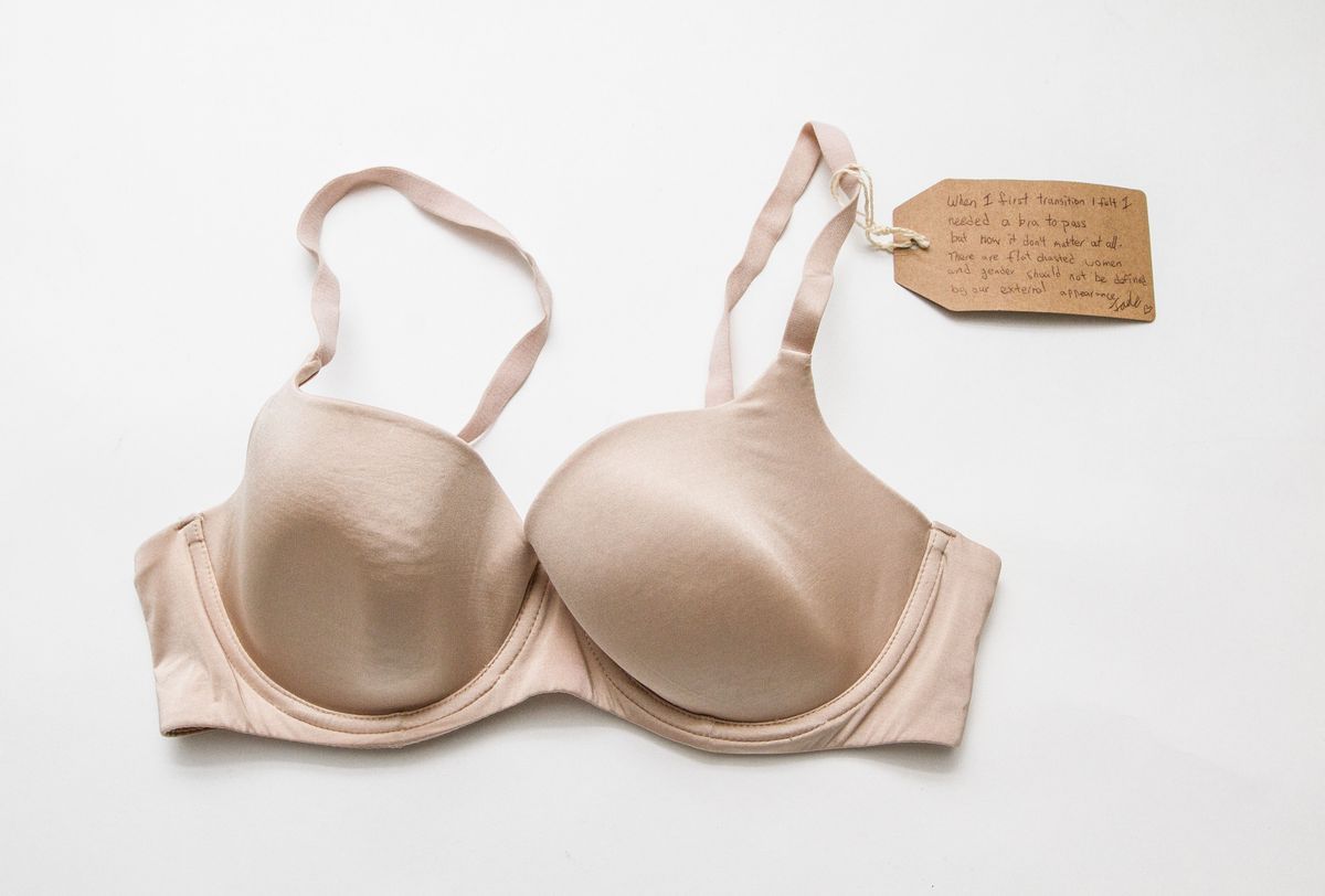 Tan bra with a tag on the left strap.