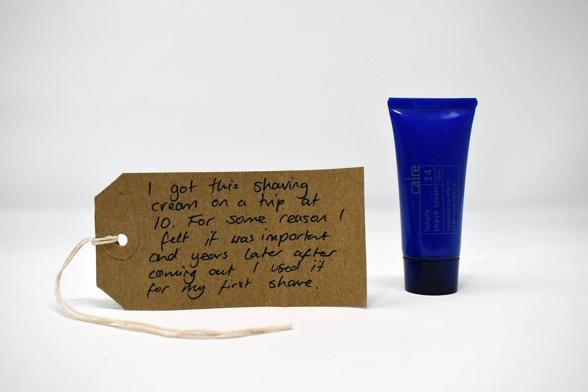 The image shows a note explaining the significance of a blue shaving cream bottle.