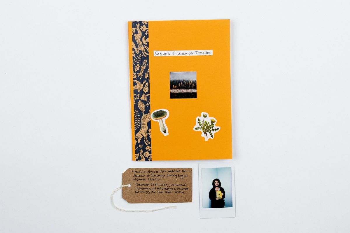 An orange booklet with stickers and photos is titled "Green’s Transition Timeline," accompanied by a handwritten tag and a polaroid.