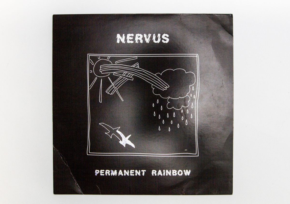 Front cover of an LP sleeve reading "NERVUS" and "PERMANENT RAINBOW"