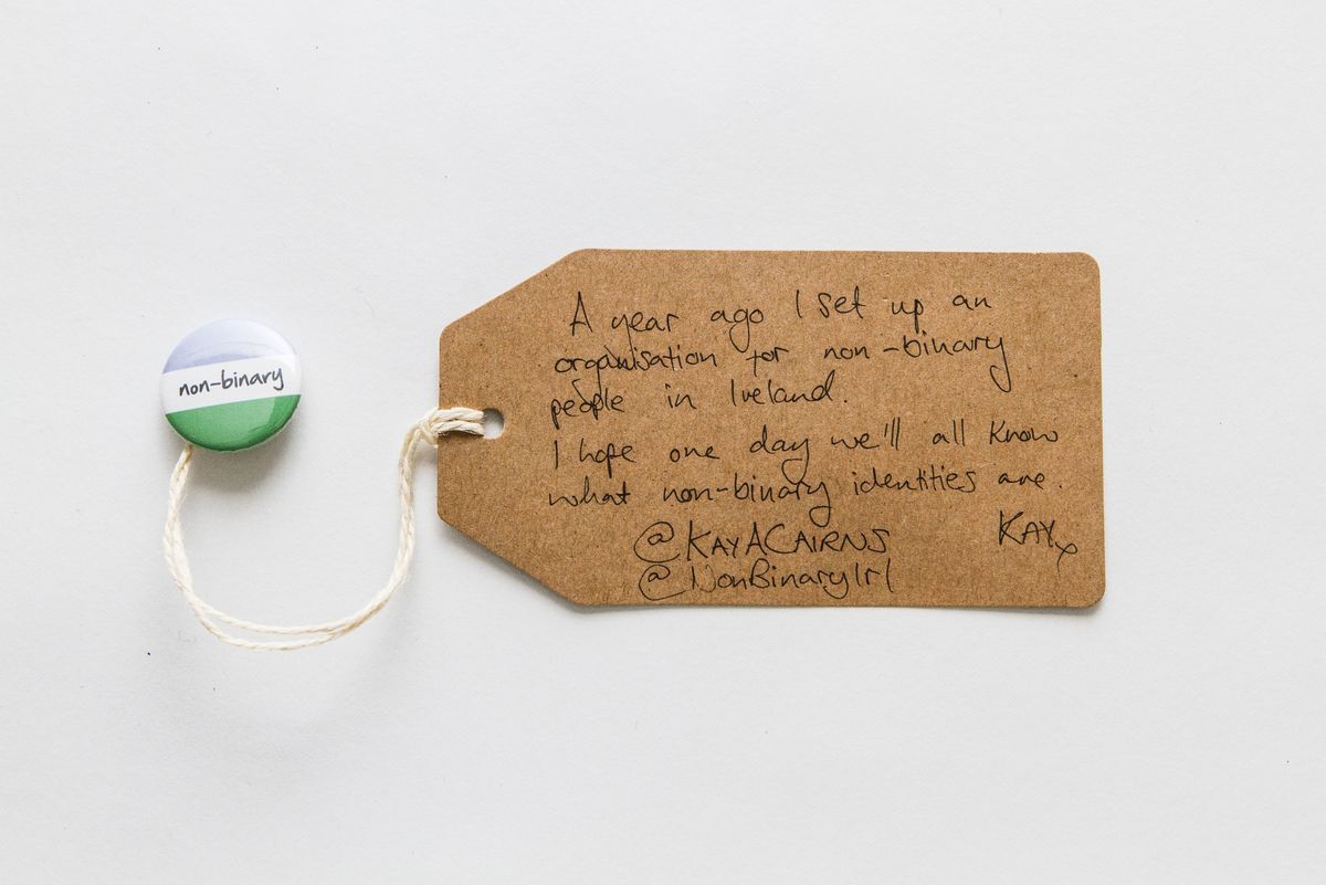 A badge which is the non binary flag and the word 'non-binary' on it.