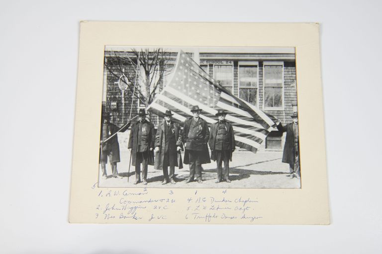 Veterans Posing with the American Flag in Front of Public School 24 picture number 1
