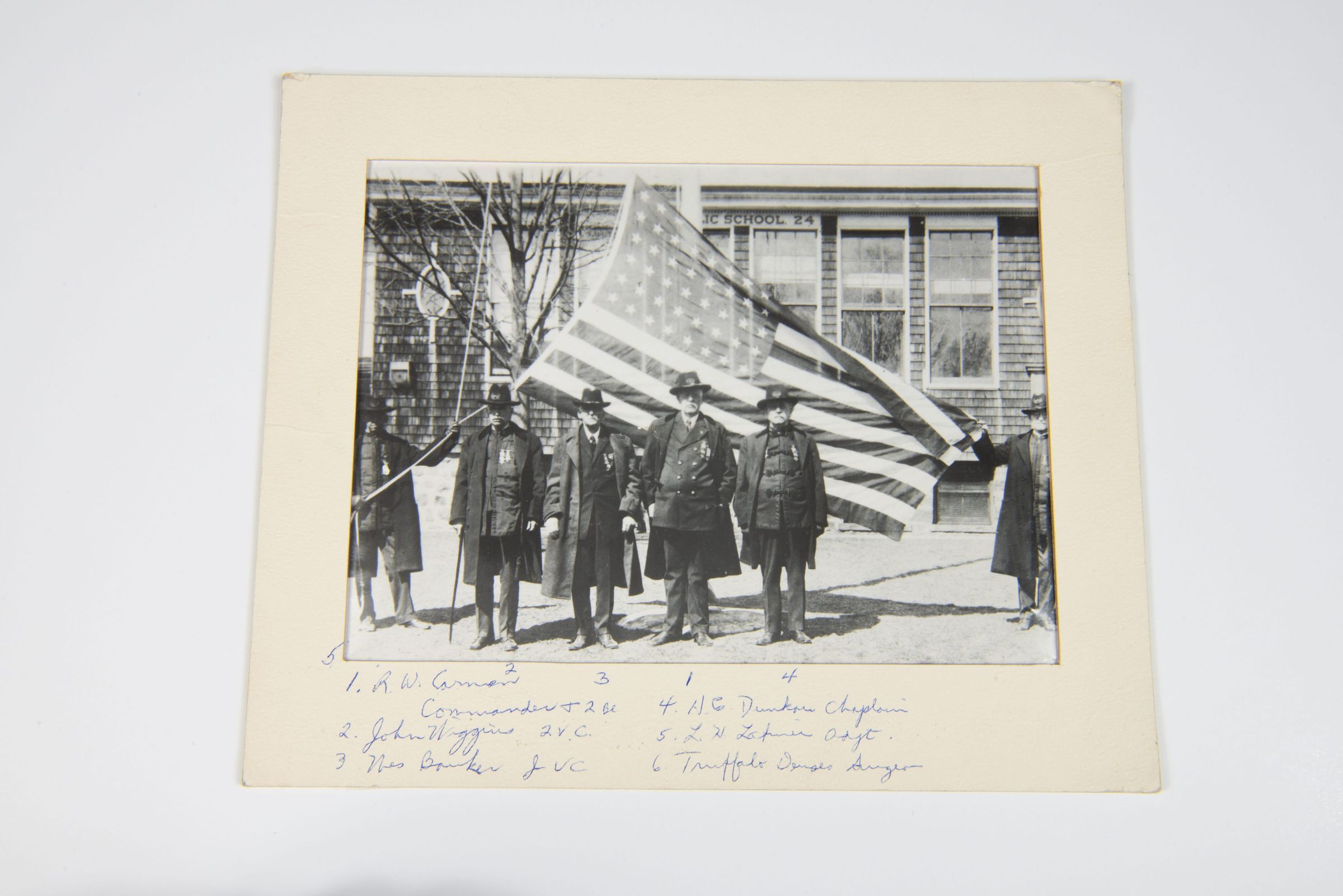 Veterans Posing with the American Flag in Front of Public School 24 picture number 1