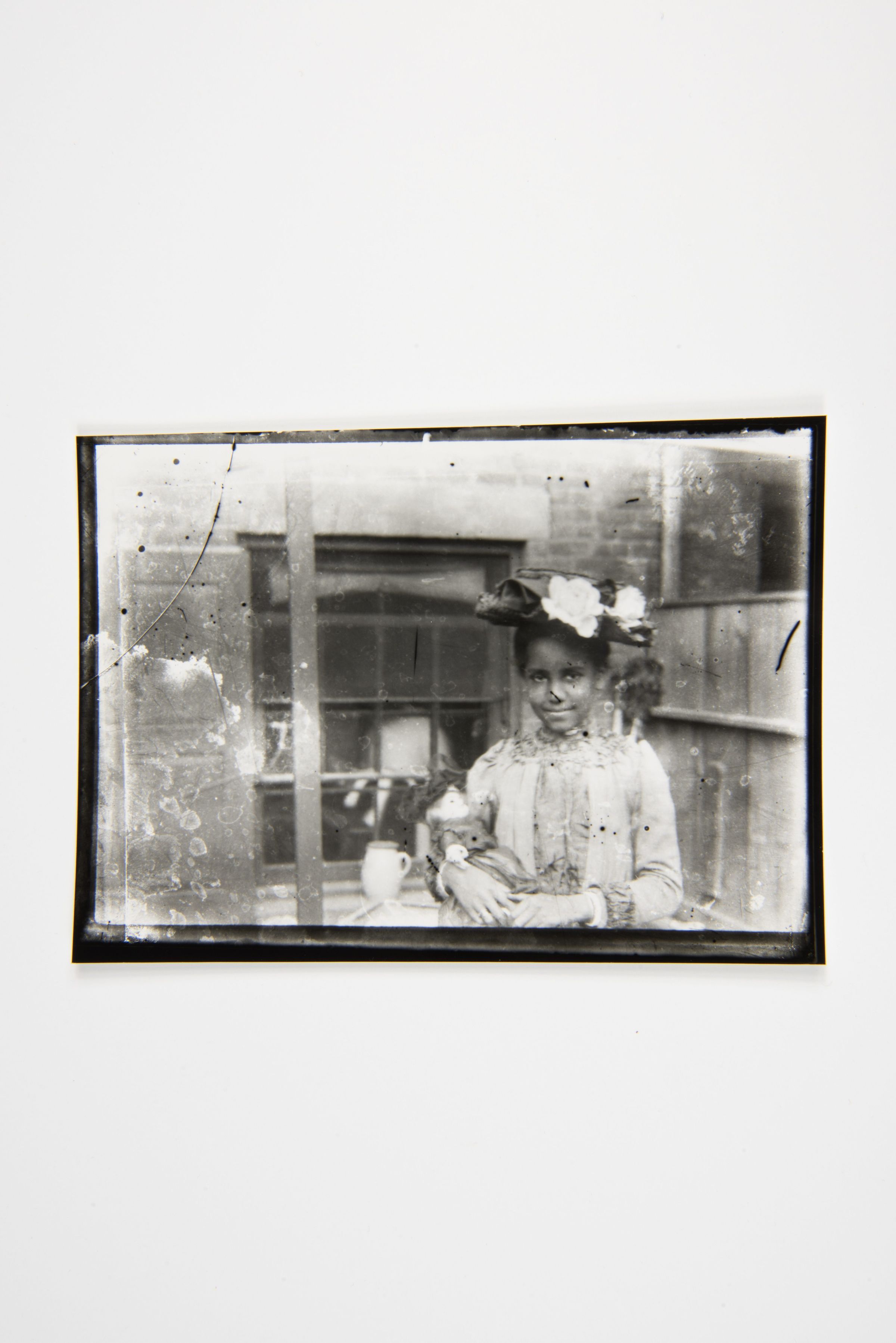 Portrait of a Young Girl Holding a Doll picture number 1