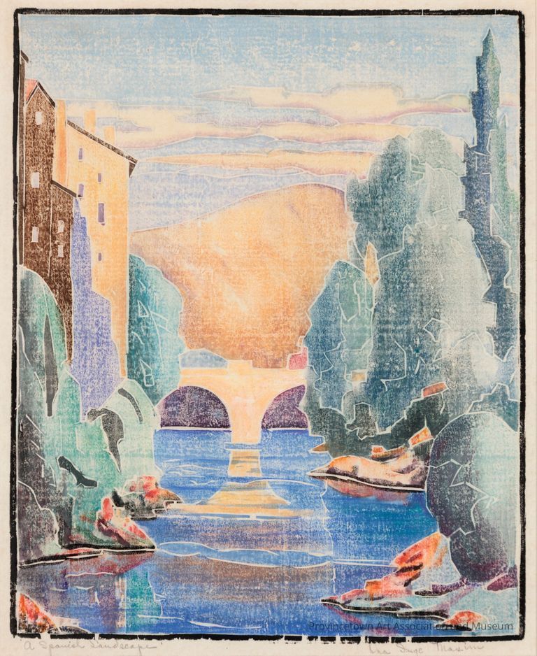 River through mountains and trees, arched bridge
