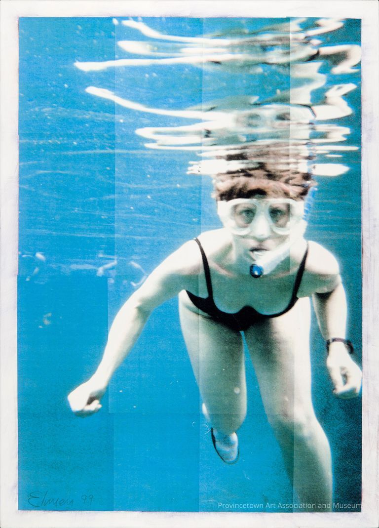Woman in bathing suit snorkeling, under water