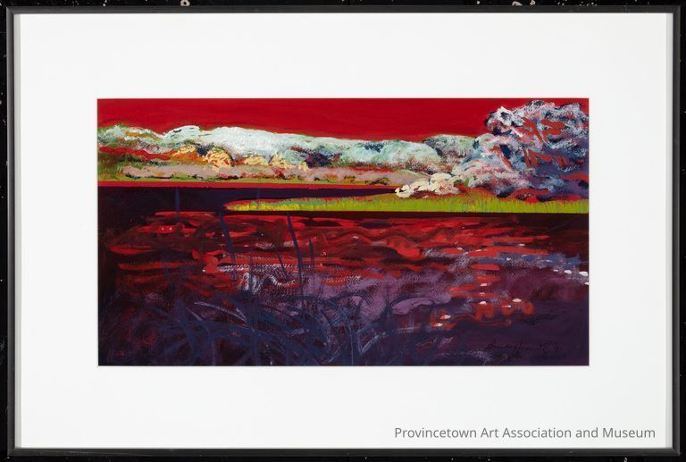 Red sky and clouds over red sea and marsh