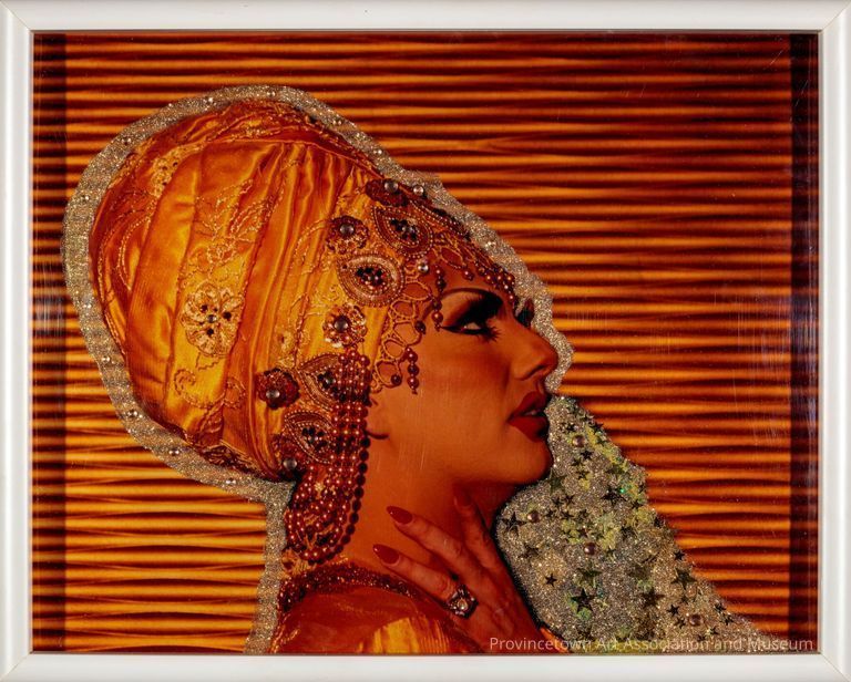 Bedazzled photo of drag queen Robbie Turner (from RuPaul's Drag Race season 8) in profile with orange turban