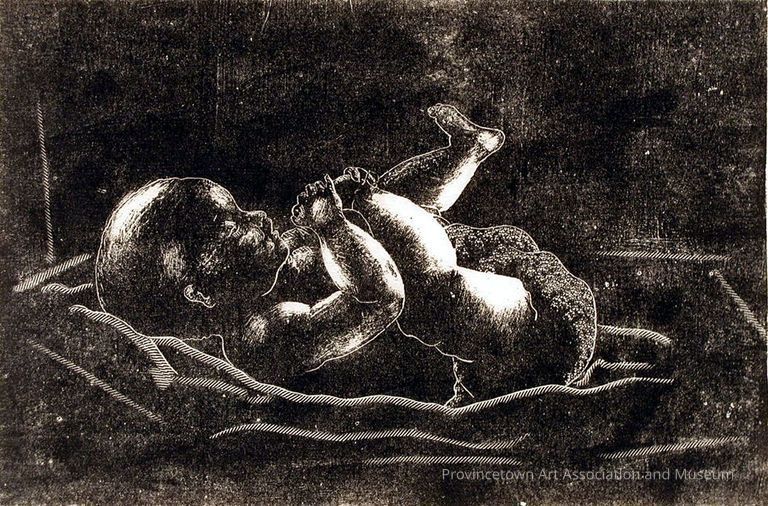 Black and white, baby lying on its back