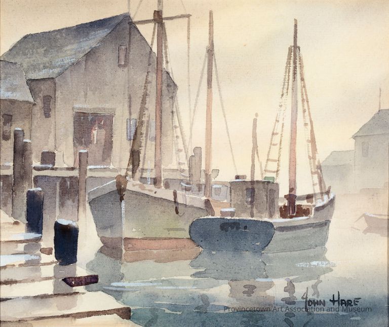 Sailboats at dock, fog on the water