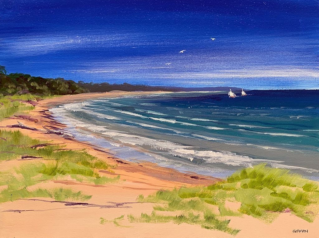 The painting depicts a serene beach scene with gentle waves lapping against the sandy shore, while lush greenery frames the coastline. In the deep blue sky above, birds glide gracefully, adding an element of life and movement. Two sailboats are visible in the distance, their white sails contrasting vividly against the expansive dark water.