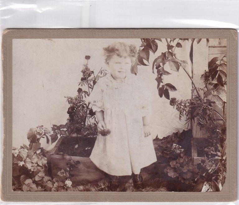 Young Child in Garden Setting — Outdoor Portrait