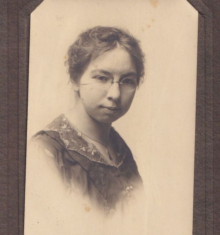 Portrait of Young Woman with Spectacles and Lace Collar
