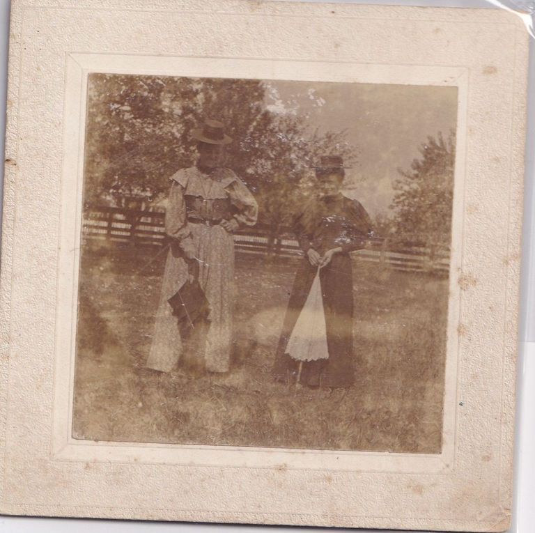 Two Wome in Hats Outdoors