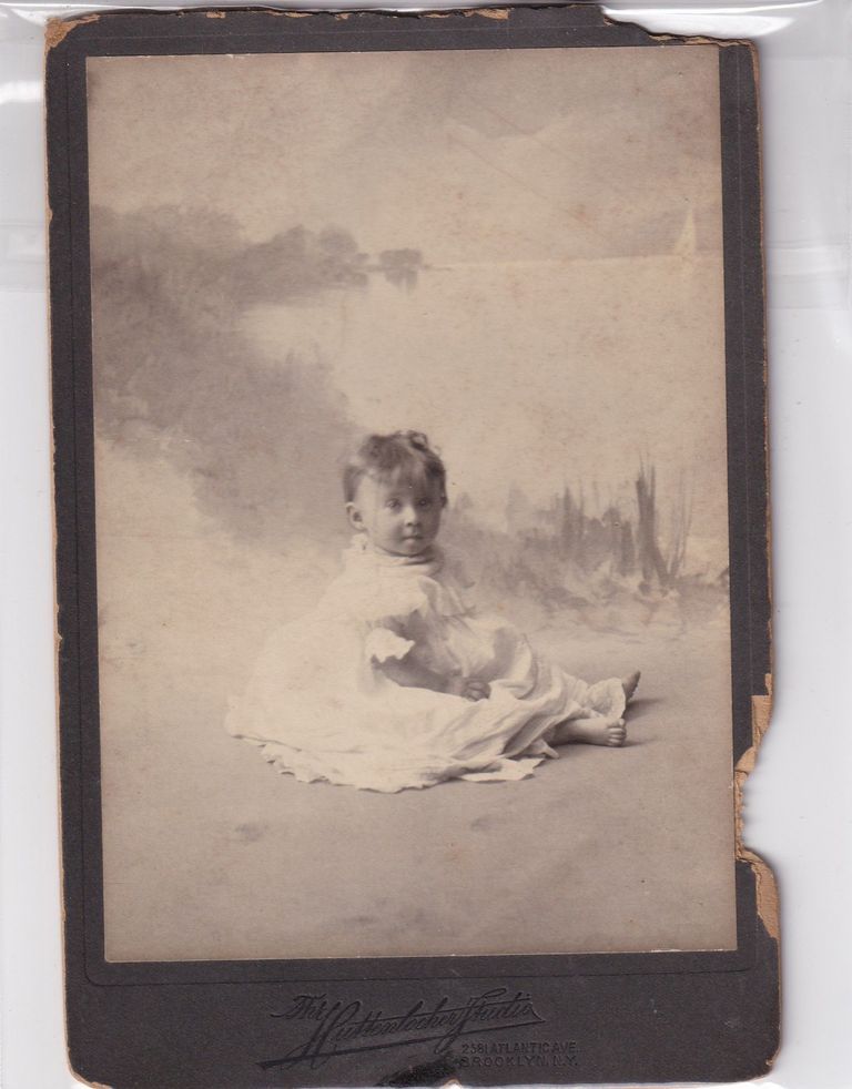 Seated Infant Before Painted Landscape Backdrop — Hittenlockher Studio Portrait